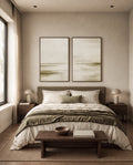 Large olive green wall art set styled above a bed in a modern bedroom